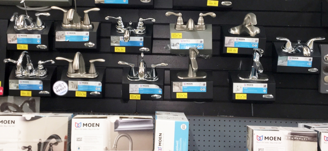Kitchen & bath faucet display wall featuring Moen faucets